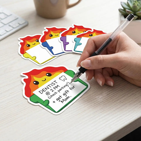 Hand writing on Dumpster Fire Sticky Notes 9 Pack Cute Shaped Self Adhesive Notepads for Office Chaos Desk Decor, colorful designs.