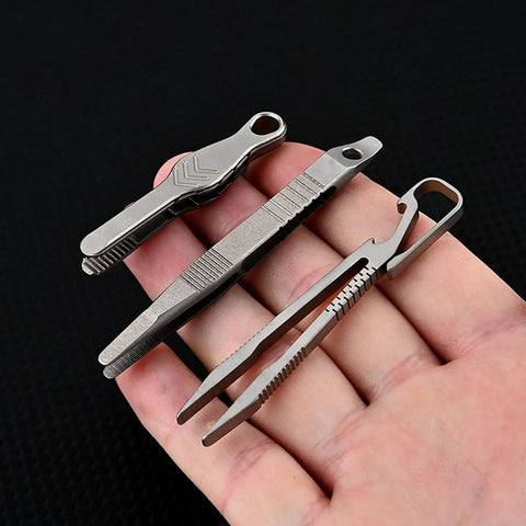 Alloy Pocket Tweezers For Camping And Hiking Gear resting on palm, compact design, rust-resistant, multipurpose splinter remover