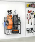 Wall Mounted Golf Bag Organizer With Rolling Storage Rack holding two golf bags, shelf for hats, hooks for towels in a garage space.