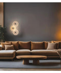 LMAPLUMP Wall Lamp Wall Sconce Modern Artistic Luxury Iron Textured Ripple Glass Light 3-Light Cluster LED illuminating a living room.