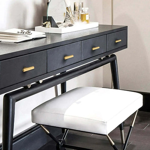 Thirty Pack Stainless Steel Cabinet Knobs And Drawer Pulls With Mounting Screws Single Hole Gold Handles on a black desk.