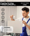 Man installing Bright Daylight 5000K A19 LED Bulbs, 800 Lumens, 9-Watt, 60-Watt Equivalent, E26 Base, Non-Dimmable, 5-Pack into lamp