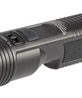 Stinger 2020 2000-Lumen LED Duty Flashlight With Charging Kit, black design, close-up view showing textured handle and lens