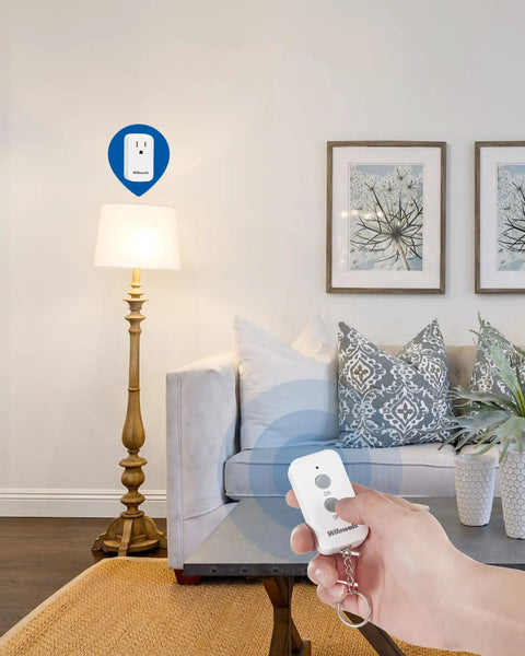 Hand holding Plug And Play Remote Outlet Switch with Wireless On Off Control for lamps in living room setting.