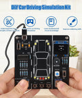 Hands holding DIY Car Driving Simulation And Soldering Practice Kit For High School And College Students with circuit board and controls.