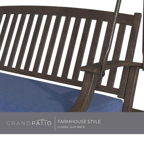 Close-up of dark blue cushion and slatted back of Two Seat Patio Swing With Adjustable Tilt Canopy Outdoor Porch Swing Farmhouse Style