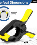 Front view of 6-inch heavy-duty plastic spring clamp, black with yellow handles, pack of 4