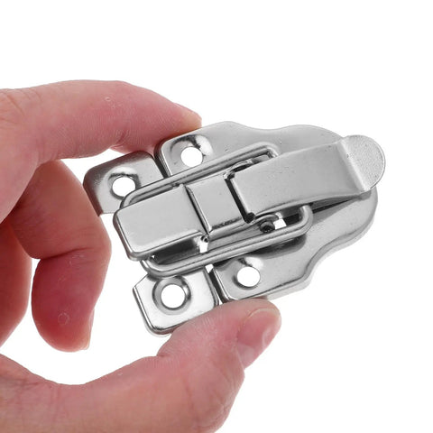 Close-up of a silver iron duckbilled toggle latch from Duckbilled Toggle Latches Set For Jewelry Boxes, Tool Chests, And Decorative Displays