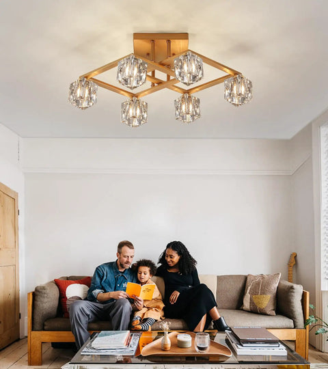 Farmhouse Chandelier With Orb Glass Globes And Oak Finish 6 Light Totally Rustic Vintage Pendant Light Fixture For Kitchen Island Dining Room Living Room Foyer And Entryway UL Listed against a living room ceiling, showing warm illumination over a family on a couch.