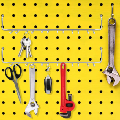 Two Pack Multi Prong Pegboard Accessories Organizer Kit With Tool Storage Hooks for workshop, holding tools against a yellow pegboard.