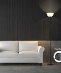 Smart RGB Floor Lamp With WiFi And App Control, 16 Million Colors, 20 Dynamic Modes next to a white sofa with foot switch displayed