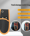 Heavy Duty Tool Pouch Built Tough With Reinforced 600D Fabric And Riveted Seams For Electricians Carpenters Skilled Trades Crews, front view with orange trim.