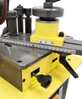 Close-up of Knockout Full Auto Saw Blade Sharpener And Grinder For Carbide Tipped And Hss Circular Blades with measurement scale and adjustment knobs.