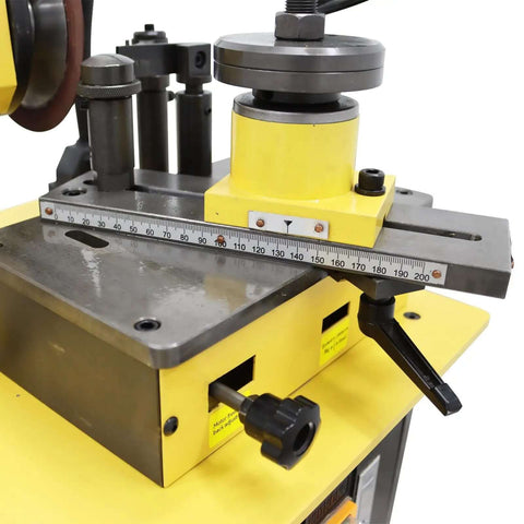 Close-up of Knockout Full Auto Saw Blade Sharpener And Grinder For Carbide Tipped And Hss Circular Blades with measurement scale and adjustment knobs.