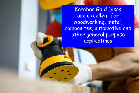 Worker using 6 Inch PSA 220 Grit Sanding Discs Open Coat With Stearated Aluminum Oxide on wood surface