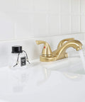 Two-Handle Bathroom Sink Faucet in Brushed Gold with Metal Push and Seal Pop-Up Drain, Included Supply Hose, Lead-Free, cUPC NSF 61 Certified