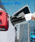 Type 2 To Type 1 EV Charging Adapter With No Sweat Anti Drop Plug Handles 32 Amps And 250V AC in use during rain near a cityscape.