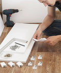 Person assembling cabinet with 120 Pcs Drawer Wedges With Stainless Steel Screws Kit for sagging drawers and reinforcement.