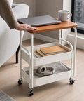 Three Tier Rolling Side Table With Lockable Casters And Spacious Storage Shelves for home organization with laptop and books.