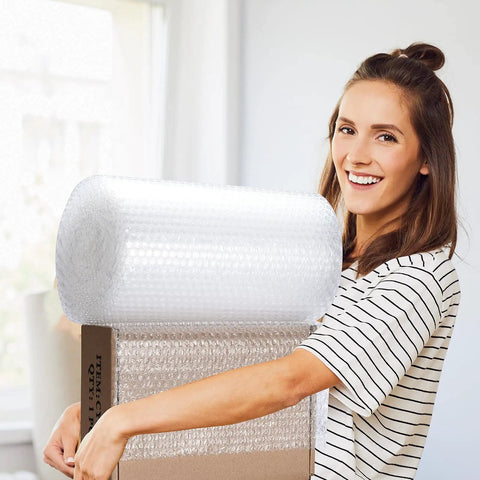 Woman holding Bubble Cushioning Wrap Roll 12 Inch Wide, 72 Feet Total, Two Perforated Rolls With Easy Tear, Includes 20 Fragile Labels
