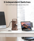 Power Strip Tower With 12 AC Outlets And 6 USB Ports on a desk in office setting, showcasing energy saving independent switches