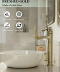 Brass Construction Black And Gold Vessel Sink Faucet With Tall High Arc Body next to white basin with bathroom background