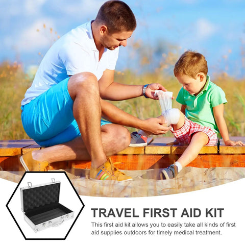 Man using a Travel First Aid Kit to bandage a child's knee outdoors on a sunny day.