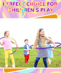 Children playing with Eight Color Hoop Exercise Rings Set Detachable Adjustable Plastic Rings For Gymnastics And Dog Agility Training Party Decor 28 Inch Classic Colors Easy Snap Clips 8 Piece Kit