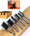 Pro Grade Six Piece Straight Router Bit Set With One Quarter Inch Shank Carbide Tipped Two Flute Bits For Woodworking Grooving Rabbet Cuts And Jointing In Diameters From One Quarter To Three Quarters Inch For A Smooth Planed Finish displayed on wooden board