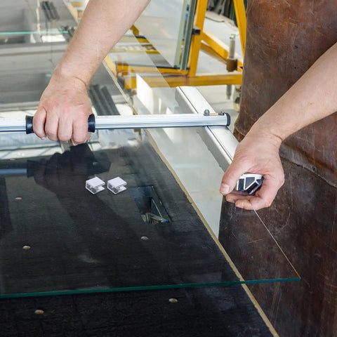 Person installing glass with Four Pack Glass Shelf Brackets For 8 10mm Shelves, Zinc Alloy Clamps With Scratch Free Surface, Easy Install.