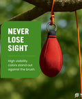 Arborist Throw Line Kit With 15Oz Throw Weight And 166Ft Ultra Slick Polyester Rope Hanging on a Tree Branch