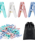 Solid Fifty Six Colorful Clothespins With Heavy Duty Spring Clips Measuring Two Inches For Everyday Drying And Diy Crafts Plus A Nifty Black Storage Bag To Keep Your Laundry Room Clean And Ready.