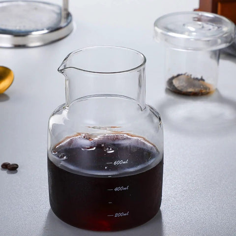 Premium Cold Brew Drip Tower With Adjustable Flow Control Borosilicate Glass Carafe with cold brew coffee inside, 600ml size.