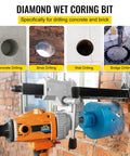 Diamond Dry Core Drill Bit Kit With Pilot Bit And 4.5 Inch Blade drilling into brick wall.