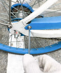 Using Beefy Industrial Grade Tamper Proof Torx Hex Key Set adjusting a screw on a bicycle wheel