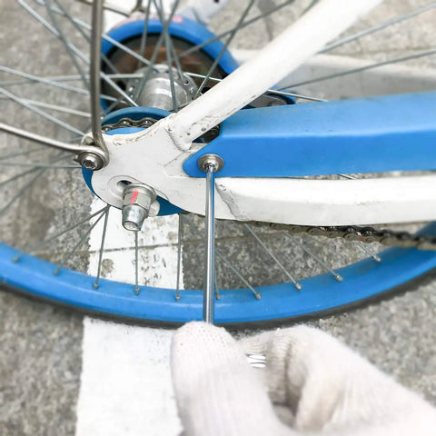 Using Beefy Industrial Grade Tamper Proof Torx Hex Key Set adjusting a screw on a bicycle wheel