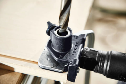 Domino Connector Kit For DF 500 Q System KV-SYS D8 in use, showcasing drill bit through connector for precise alignment.
