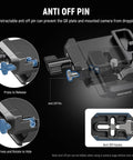 Close-up of foldable V mount battery plate showing anti-off pin mechanism and Arca type quick release baseplate for DSLR video rig.