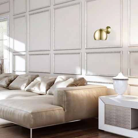 One Light Plug In Or Hardwire Wall Sconce With Vintage Glam Matte Brass Finish in elegant living room.