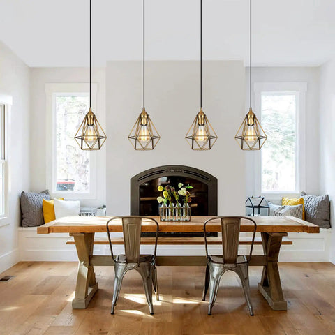 Dining room with 2 Pack Plug In Pendant Lights Matte Gold Vintage Brass Cage Fixtures With 15 Ft Cord And On Off Switch, Easy 2 In 1 Install For Living Room, Kitchen Island Or Bedroom, Modern Rustic Glow hanging above a wooden table.