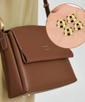 Brown handbag with Magnetic Purse Feet For Handbags 4 Pack No Hole Design Metal Bag Feet Protectors shown in inset