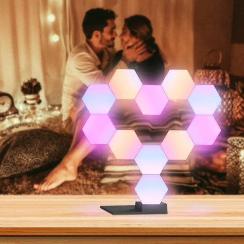 Lit Smart Hexagon LED Light Kit, 10 Pack WiFi Wall And Tabletop Blocks on tabletop with mood lighting in cozy setting