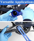 Hands using 6-In-1 Bike Crank Removal Tool And Bottom Bracket Wrench For 12/16 Notches And 39/41/44/46/49mm Sizes on a bicycle