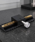 Pro Grade Linear Motion Dovetail Rail Stage Slide For Precise Alignment, 40x40 Table, 250mm Length, 25mm Travel, Dual 100mm Guides, 3kg Load, 0.06mm Parallelism, 210mm Stroke, Anodized Aluminum Body For Lightweight Rigidity, close-up of black stage slide