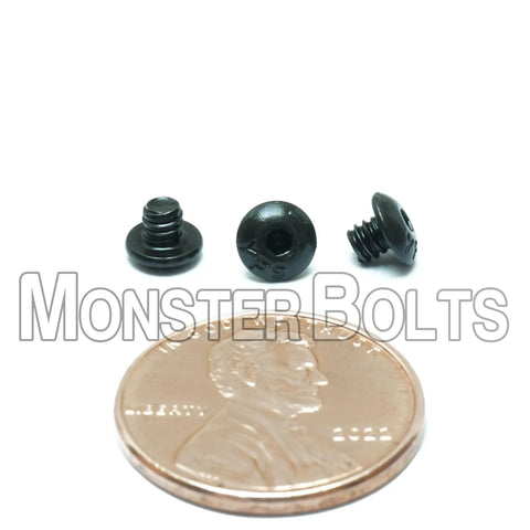 Heavy Duty Size 4-40 Button Head Socket Cap Screws One Eighth Inch Long with a penny for size reference.