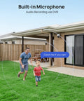 Father and son playing in backyard, Hardwired Security Camera System with Night Vision and One Way Audio visible on house wall.