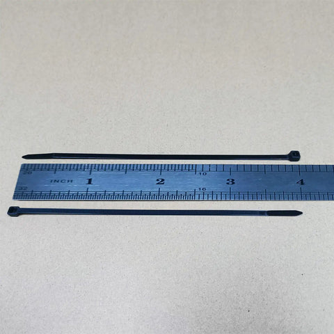 Beefy 4 Inch Zip Ties 1000 Pack self-locking nylon 66 black ties with 18 lb tensile strength next to ruler