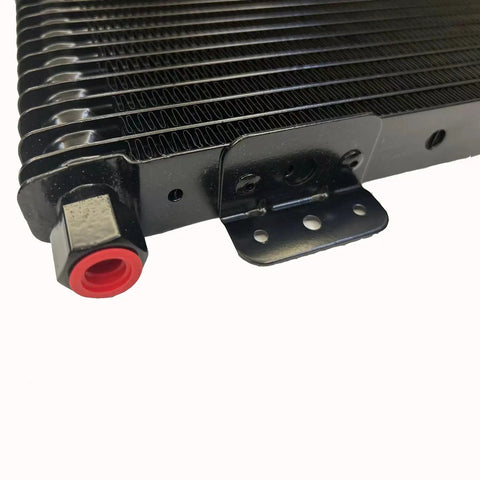 Close-up of Low Pressure Transmission Oil Cooler for heavy duty towing, black core with red connector, 8.5x22.75x1.3 inches