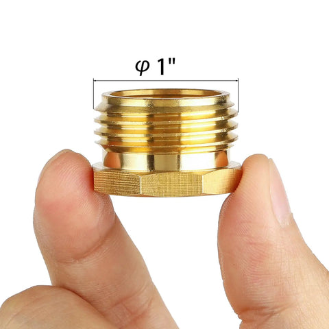 Brass Garden Hose Pipe Plug End Cap Three Quarter Inch GHT Male Threaded Fitting held by fingers, showing size.