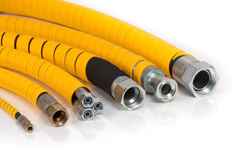 Safe-Spiral Pre-Cut Hose And Cable Protector Wrap Slick Spiral Shield - Yellow HDPE, 1 Inch OD, 25 Foot Pre-Cut Length, shown on hoses